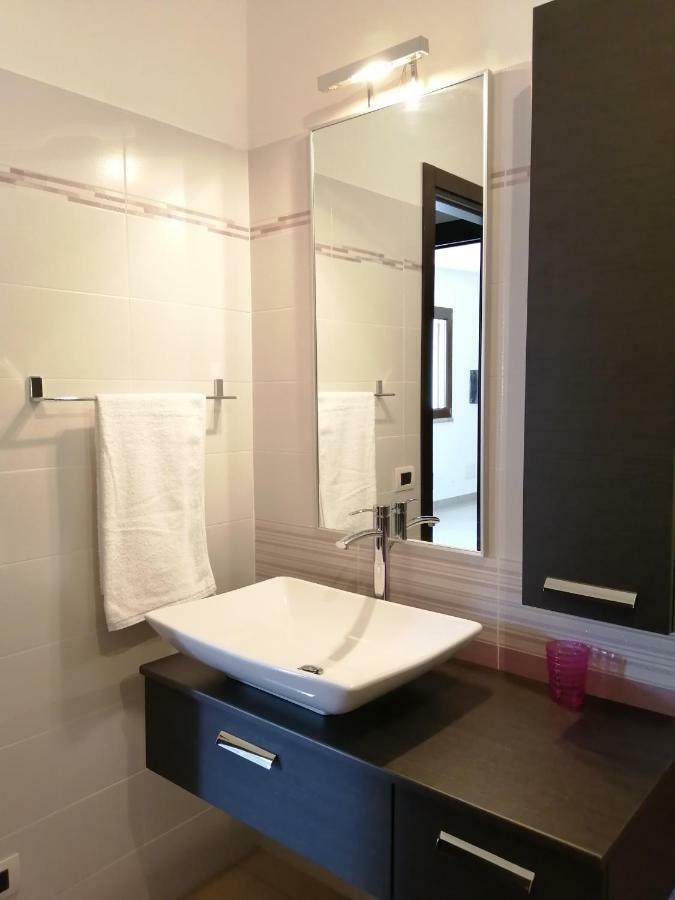 Appartement Casa Il Cortile Fiorito à Tortolì Extérieur photo